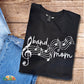 band mom design with music notes in white on black tshirt
