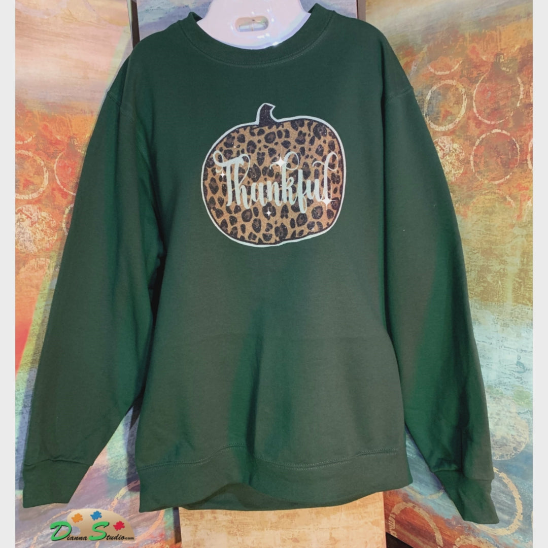 full length of winter green sweatshirt and glitter cheetah print design.