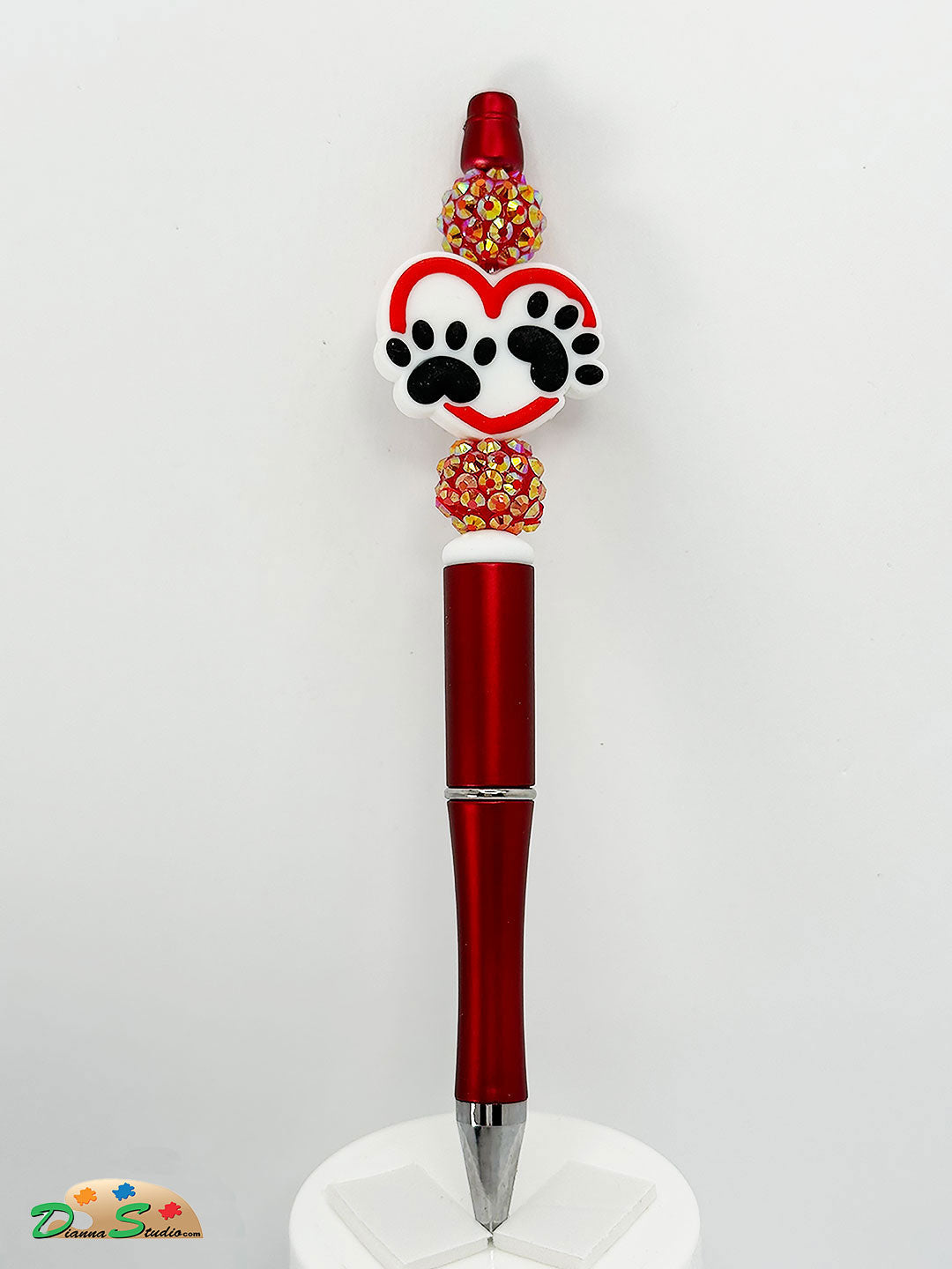 Red Pen with dog paws and heart