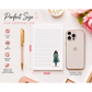 Notebook with pen, phone, and flowers on a white surface with size comparison text.