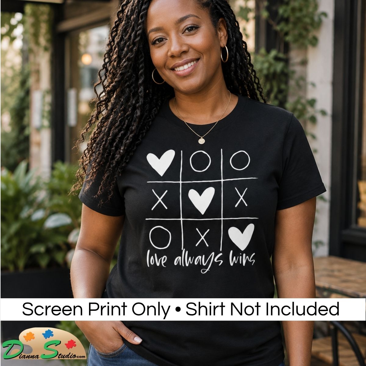 A woman wearing a black graphic t-shirt with a white tic-tac-toe design and the text 'love always wins'. A white banner at the bottom reads 'Screen Print Only • Shirt Not Included' with a 'DiannaStudio logo.