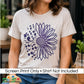 A woman wearing a light heather gray t-shirt with a purple sunflower graphic on the front, set in a cafe environment. A text banner at the bottom reads 'Screen Print Only • Shirt Not Included' with a 'DiannaStudio logo.
