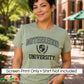 Screen Print Design “Motherhood University” and Crest logo in black. A happy woman wearing an Olive Green short sleeve crewneck tee. 